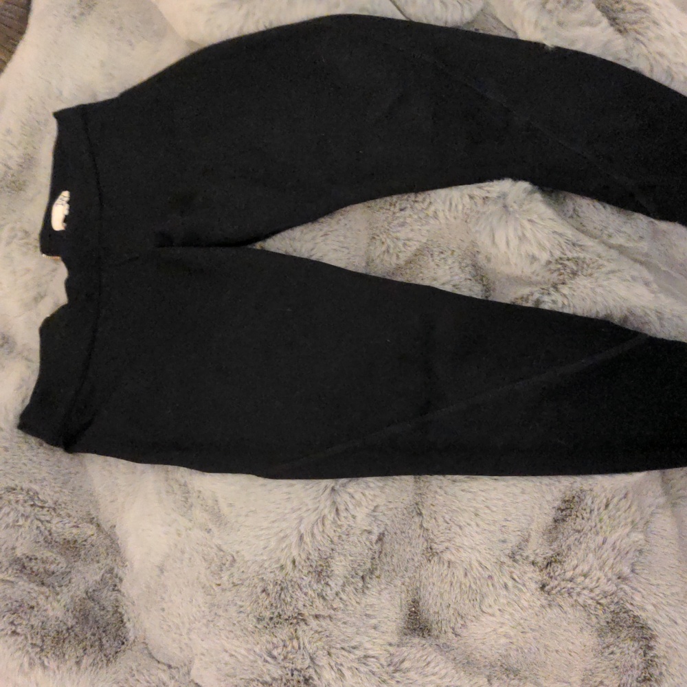 Black legging with back zipper and zippers at ankles